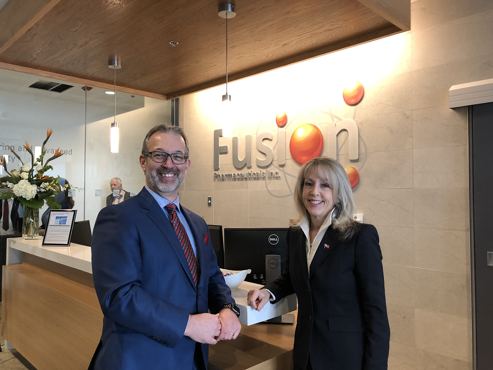 Fusion CEO and chemistry professor John Valliant and Ontario Minister of Training, Colleges and Universities Merrilee Fullerton.
