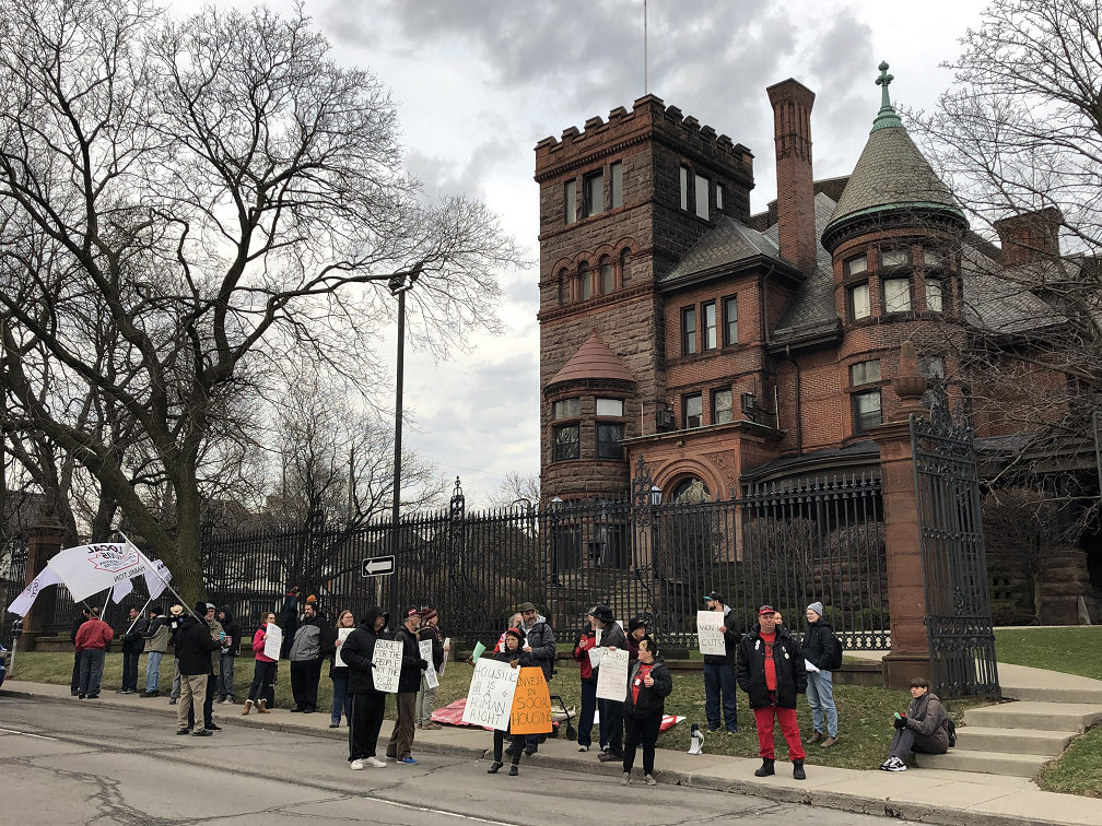 Protesters from ACORN and the Hamilton and District Labour Council rallied outside of the Scottish Rite on Friday morning.