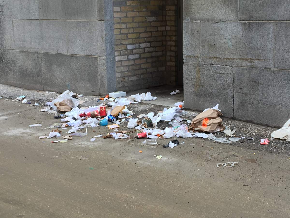 Litter lines an ally in downtown Winnipeg.