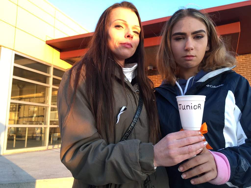 Jessica Robinson (left) and Samarah Loucks (right) stand together outside the Elgin-Middlesex Detention Centre during a vigil for Loucks’ dad, Sean William “Junior” Tourand-Brightman on April 28, 2019. Robinson, whose sister died at EMDC nearly 10 years ago, says she had to be at the vigil “to let [the family] know that they’re not alone in what they’re feeling.”