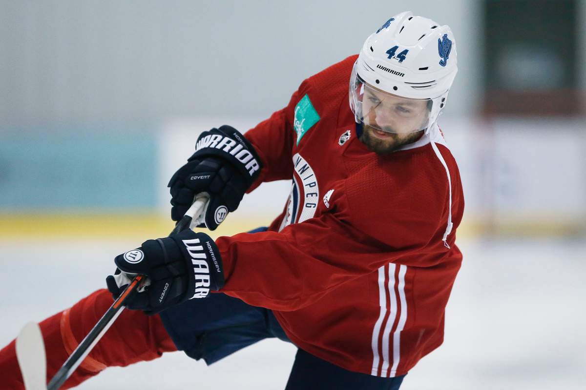 Winnipeg Jets' Josh Morrissey (44) shoots during practice prior to their first round of NHL playoff action against the St. Louis Blues in Winnipeg, Monday, April 8, 2019. THE CANADIAN PRESS/John Woods.