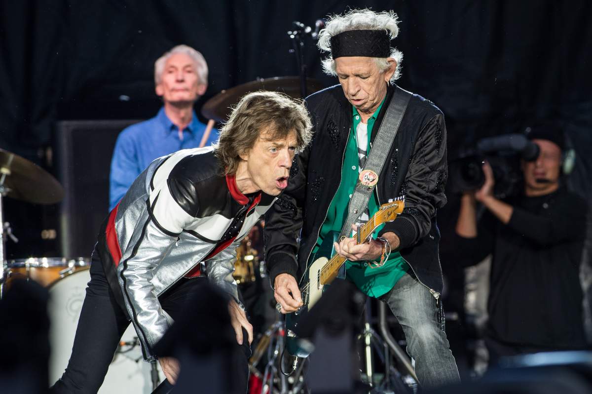 Mick Jagger (L) and Keith Richards of The Rolling Stones perform live on stage at London Stadium on May 22, 2018 in London, England.