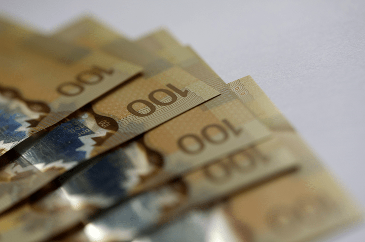 Police say they have charged two men and are seeking a third after an elderly Pickering man was allegedly defrauded of thousands of dollars.