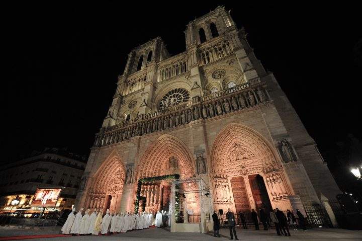 Catholic priests enter Notre Dame de Paris cathedral, on December 12, 2012 in Paris, as part of its 850th anniversary.