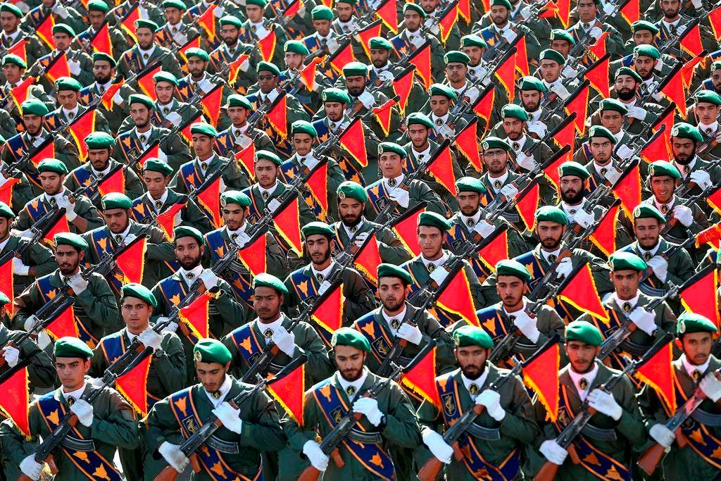 Iran's Revolutionary Guard troops march in a military parade.
