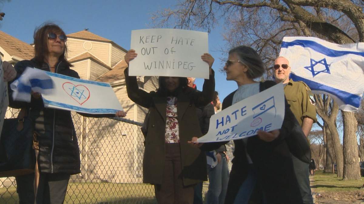 Protestors lined up outside the Ukrainian Labour Temple before an event featuring activist Linda Sarsour Friday.