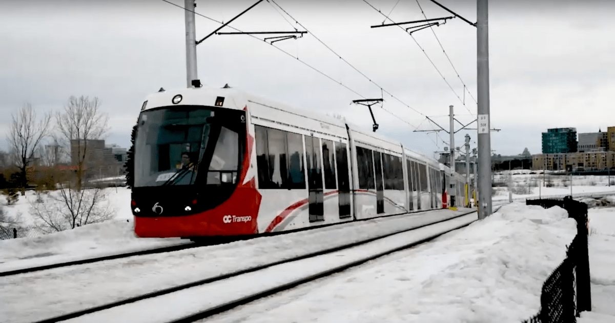 A screen capture of a set of coupled LRT train cars being tested in the snow.