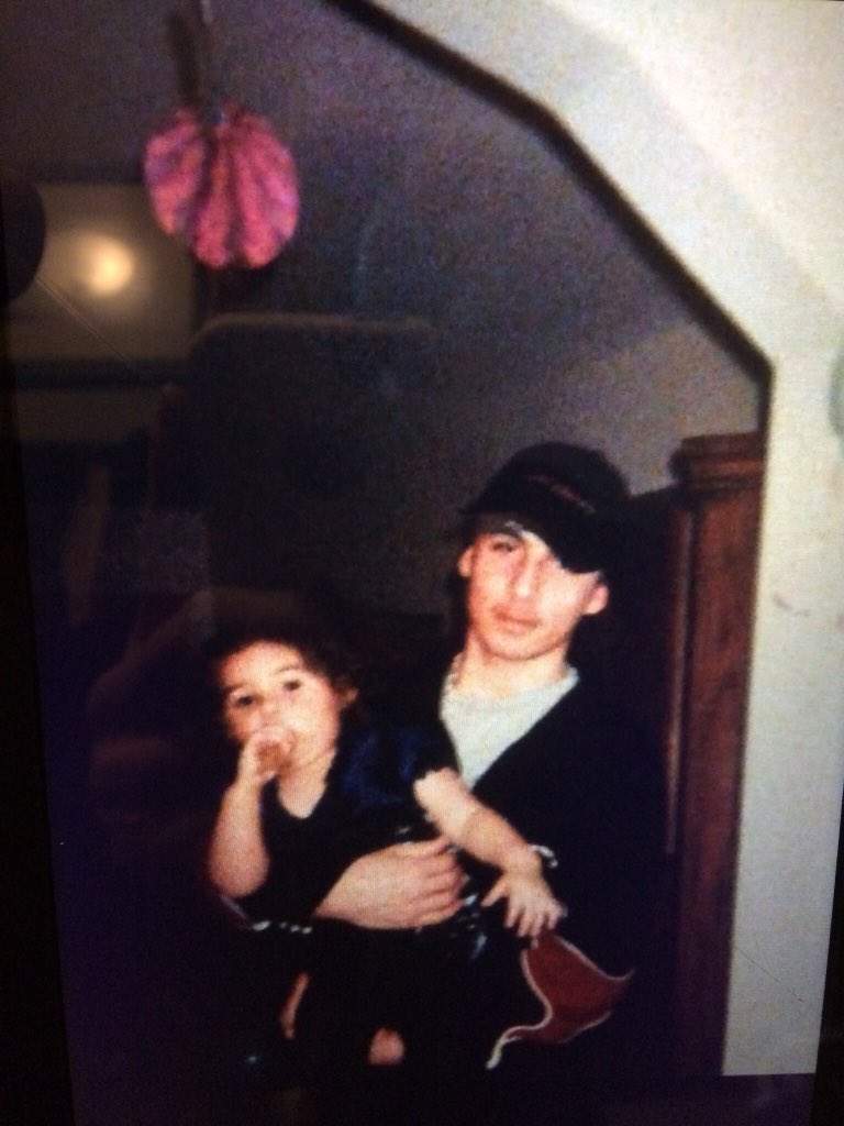 Spencer Lee Hill holding his niece, Destiny Hill.