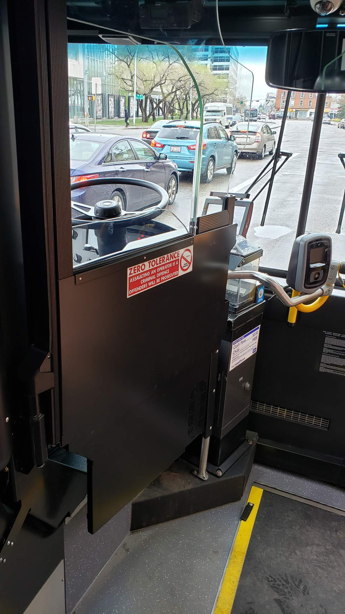 New operator retractable shields are being installed on four Edmonton Transit buses in order to determine installation requirements on different bus models within the fleet. May 15, 2019.
