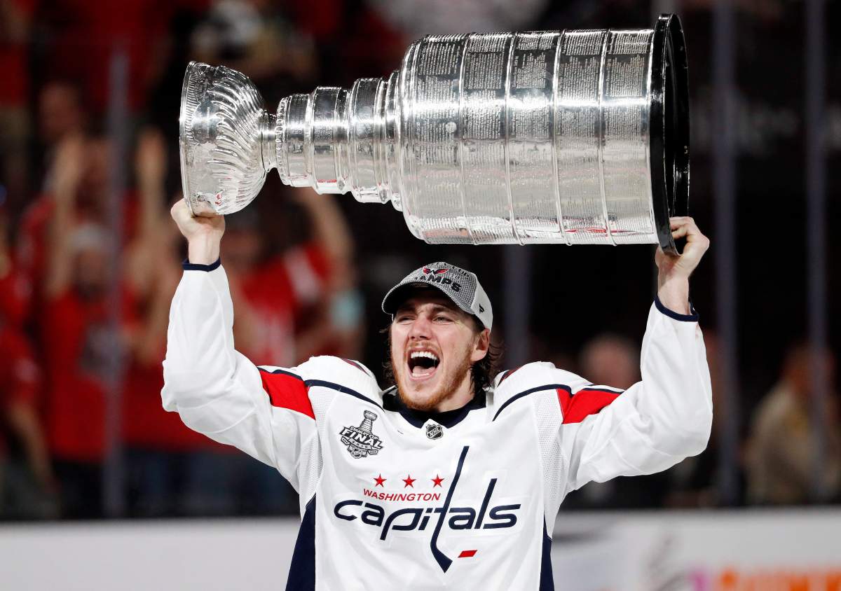 Washington Capitals right wing T.J. Oshie hoists the Stanley Cup after the Capitals defeated the Golden Knights 4-3 in Game 5 of the NHL hockey Stanley Cup Finals Thursday, June 7, 2018, in Las Vegas.