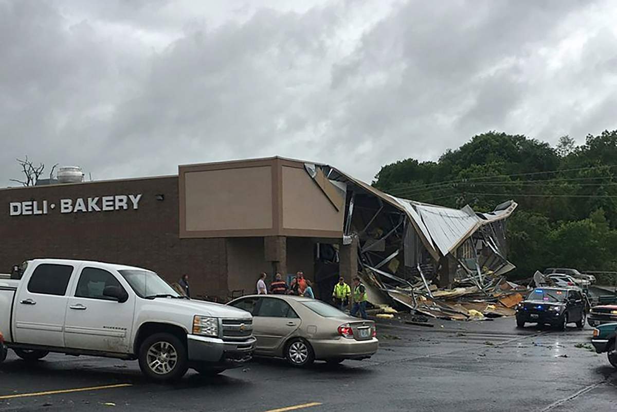 This Tuesday, May 21, 2019 photo released by Missouri State Highway Patrol shows the storm damage from a suspected tornado in Wright County at the Town and Country Supermarket in Hartville, Mo. Forecasters say parts of Oklahoma, Missouri and Kansas could see more severe weather Wednesday.