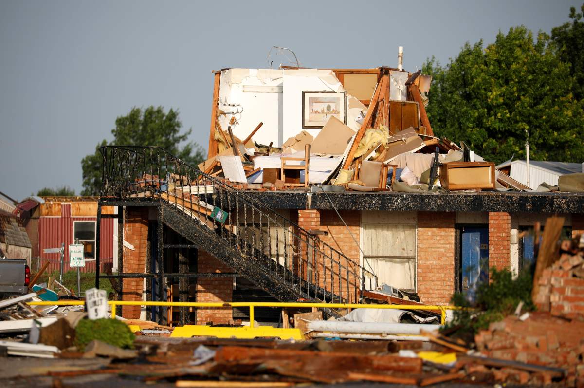 Debris covers the American Best Value Inn after it was destroyed by a tornado which touched down overnight in El Reno, Okla., U.S. May 26, 2019.