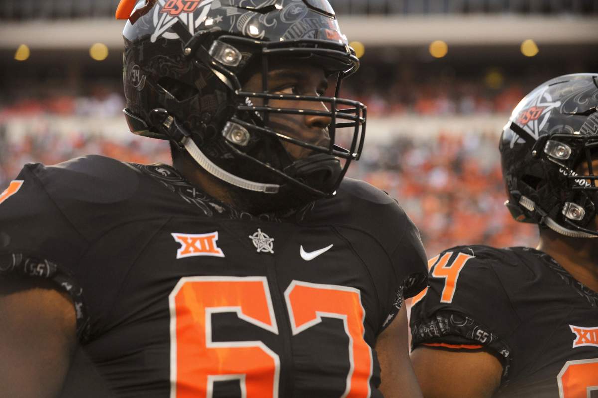 Oklahoma State offensive lineman Shane Richards walks the field prior to an NCAA college football game in Stillwater, Okla., Saturday, Sept. 8, 2018. The Toronto Argonauts drafted him on May 2, 2019.