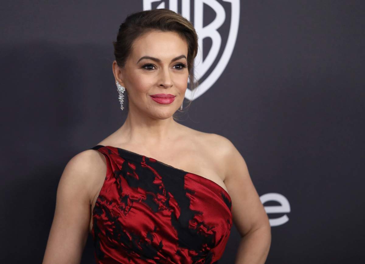 FILE - In this Jan. 6, 2019 file photo, Alyssa Milano arrives at the InStyle and Warner Bros. Golden Globes afterparty at the Beverly Hilton Hotel in Beverly Hills, Calif.
