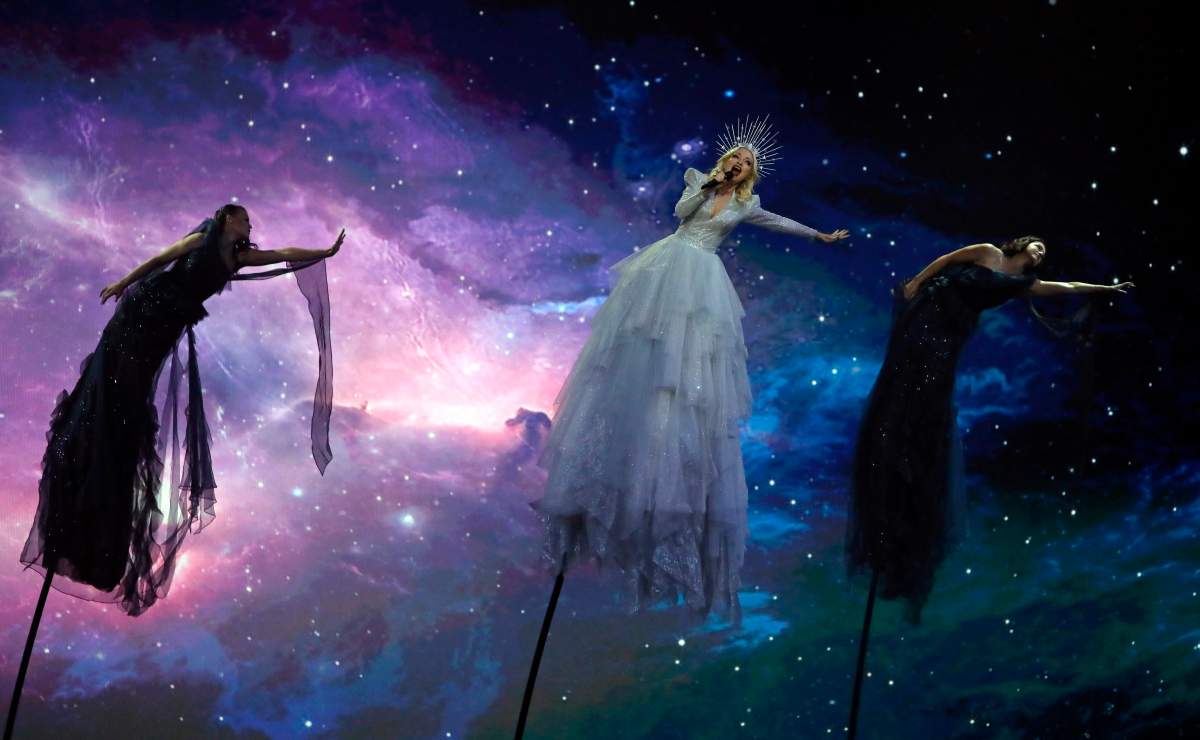 Kate Miller-Heidke of Australia, center, performs the song “Zero Gravity” during the 2019 Eurovision Song Contest grand final in Tel Aviv, Israel, Saturday, May 18, 2019.