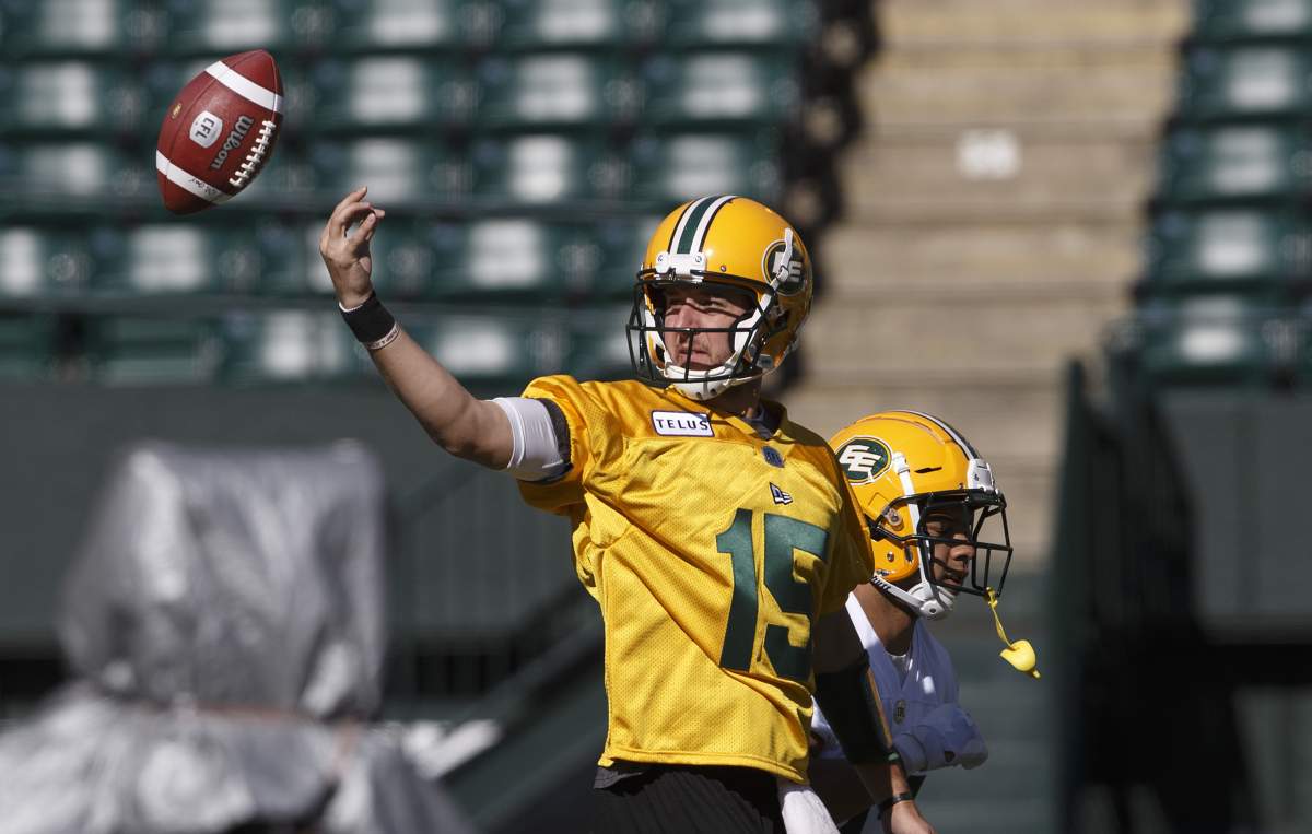 Edmonton Eskimos quarterback Logan Kilgore (15) tosses the ball during training camp in Edmonton, Alta., on Sunday May 19, 2019. 