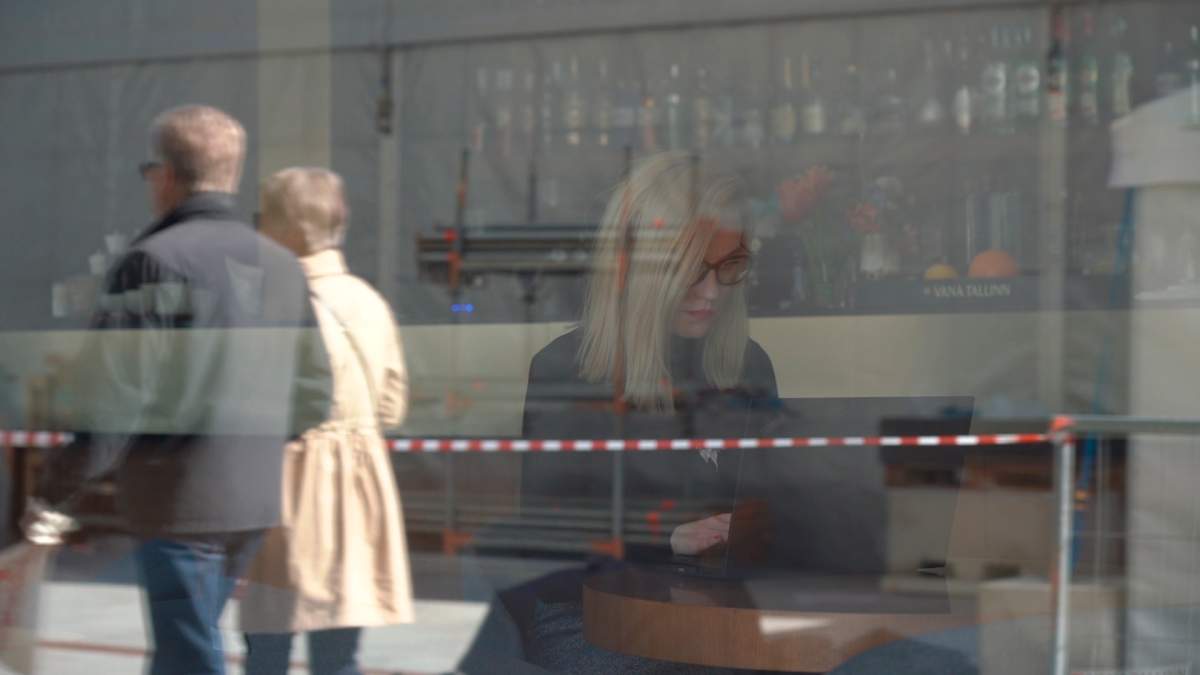 Linda Lainvoo votes online in the European elections from the comfort of a cafe in Estonia's capital, Tallinn, Thursday May 16, 2019.