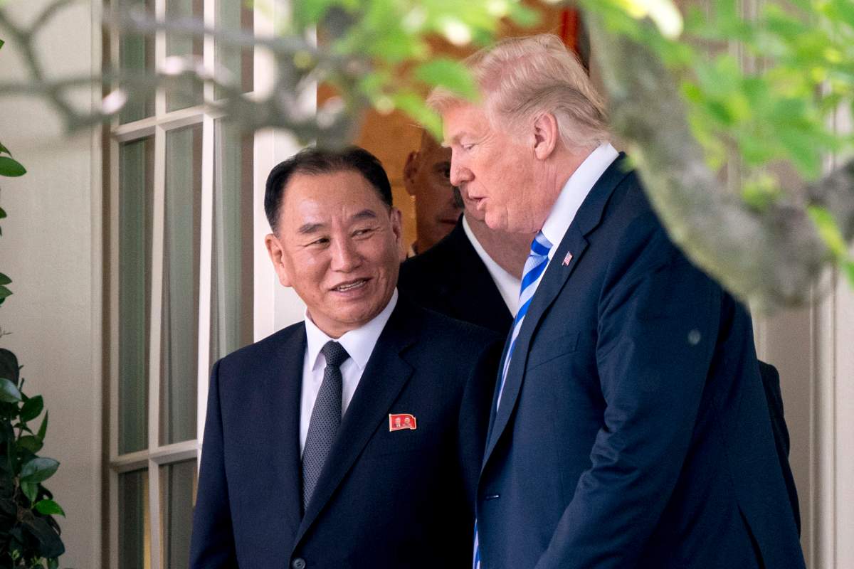 FILE – In this June 1, 2018, file photo, U.S. President Donald Trump, right, talks with Kim Yong Chol, former North Korean military intelligence chief and one of leader Kim Jong Un’s closest aides, as they walk from their meeting in the Oval Office of the White House in Washington.
