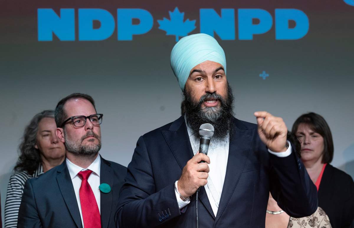 NDP Leader Jagmeet Singh presents the party's plan for climate change as deputy leader Alexandre Boulerice looks on in Montreal on Friday, May 31, 2019. 