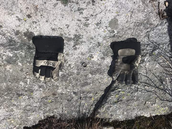 A photo of a man’s lost wedding ring that was found at Big White on May 23. The man lost it while skiing in late January. A Big White millworker found the ring. Beside the ring are the millworker’s gloves.