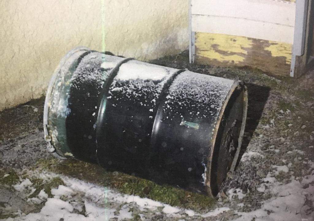 A barrel is seen in a Winnipeg yard in this undated handout photo provided by Manitoba Court of Queen’s Bench. Perez Cleveland, 46, has pleaded not guilty in the death of 42-year-old Jennifer Barrett, whose body was found in a barrel behind their Winnipeg home in December 2016. THE CANADIAN PRESS/HO, Manitoba Court of Queen’s Bench *MANDATORY CREDIT*