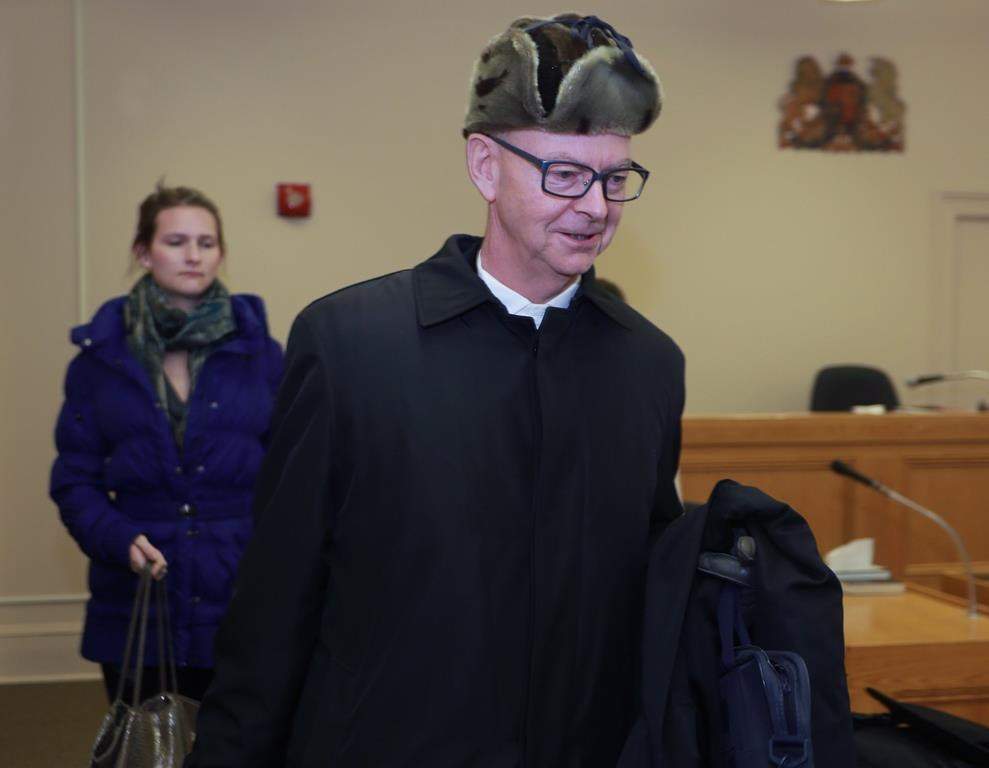 Lawyer Ches Crosbie arrives at the Supreme Court in St. John's on Tuesday, Nov. 18, 2014. As the son of retired political heavyweight John Crosbie, Ches Crosbie presents Newfoundlanders and Labradorians with a familiar name as he seeks to become the province's next premier in the May 16 election.