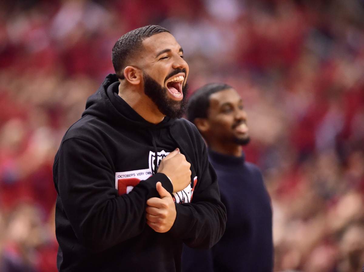 Drake smiles as he watches the Toronto Raptors take on the Milwaukee Bucks during first-half action in Game 4 of the NBA Eastern Conference Final in Toronto on Tuesday, May 21, 2019. THE CANADIAN PRESS/Frank Gunn