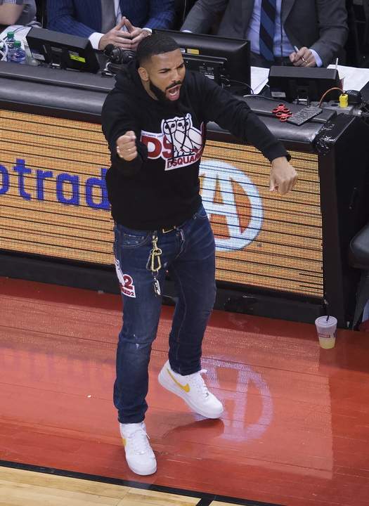 Rapper Drake reacts after the Toronto Raptors score a basket against the Milwaukee Bucks during second-half NBA Eastern Conference finals basketball action in Toronto on Tuesday, May 21, 2019. THE CANADIAN PRESS/Nathan Denette
