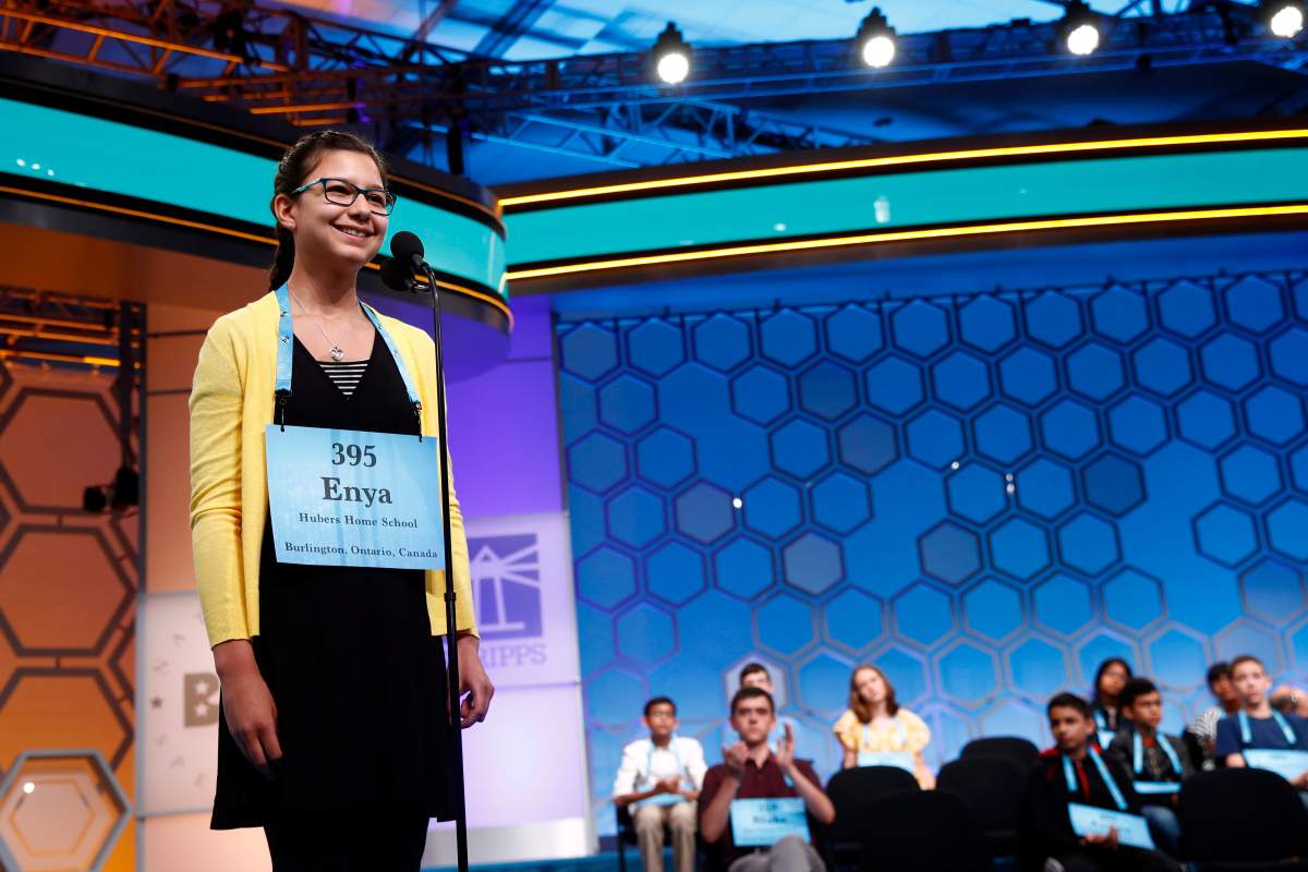 Enya Hubers, 13, of Ontario, Canada, reacts after correctly spelling a word in the finals of the Scripps National Spelling Bee, Thursday, May 30, 2019, in Oxon Hill, Md.