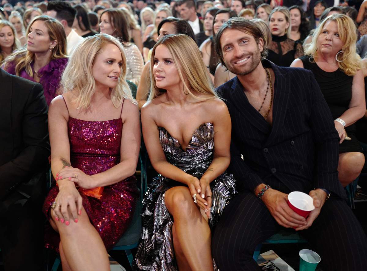 (L-R) Miranda Lambert, Maren Morris and Ryan Hurd pose in the audience during the 54th Academy of Country Music Awards at MGM Grand Garden Arena on April 7, 2019 in Las Vegas, Nev.
