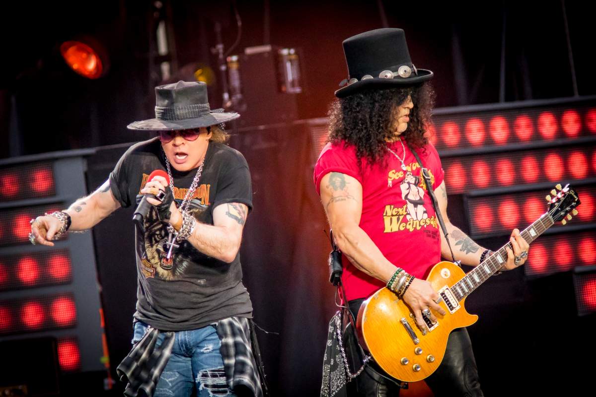 OTTAWA, ON - AUGUST 21:  Axl Rose and Slash of Guns N' Roses perform onstage during the 'Not In This Lifetime' Tour  at TD Place Stadium on August 21, 2017 in Ottawa, Canada.  (Photo by Mark Horton/Getty Images).