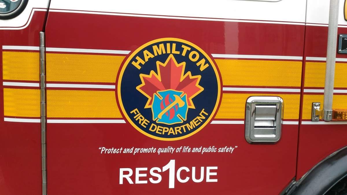 Hamilton firefighters rescued a victim from an apartment fire near the bottom of the Claremont Access early Wednesday morning.