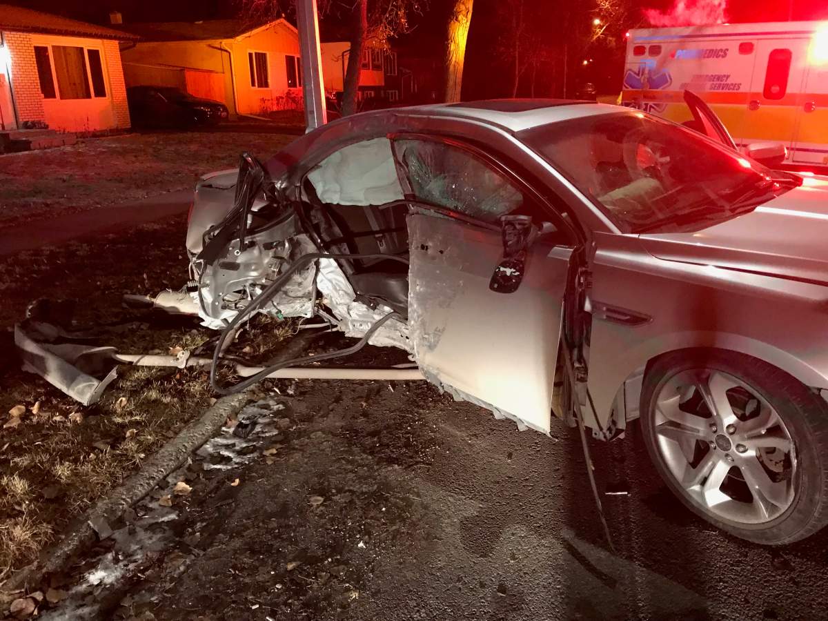 Photo shows the damaged vehicle Tia Hildebrand was in after it struck a tree.
