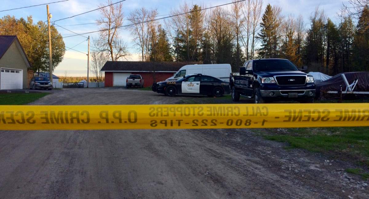 OPP investigate an alleged homicide at a residence in Trent River on Tuesday, May 7. A Selwyn Township man has been charged with first-degree murder.