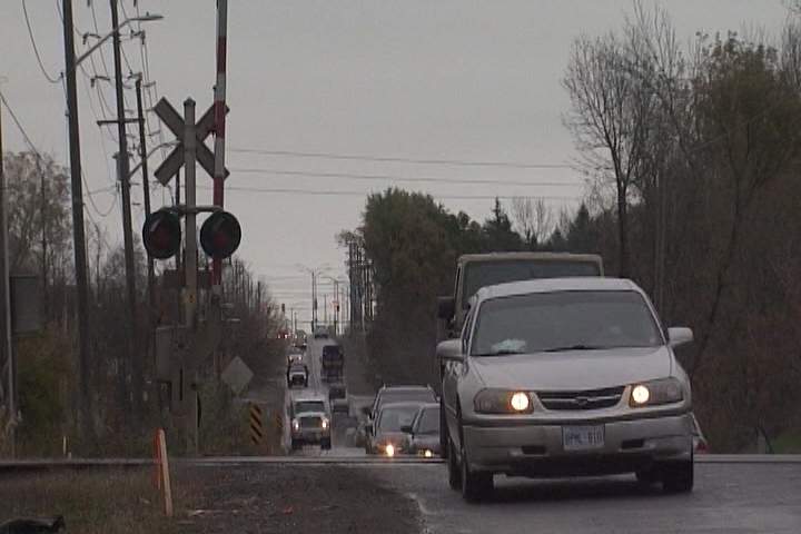 The 10-year, $63-million widening of John Counter Boulevard to four lanes, with the construction of a railway overpass, is considered a vital part of the city’s transportation plan.