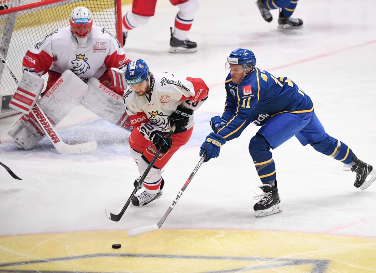 Czech Republic's Hynes Zohorna, left, challenges Sweden's Joakim Nygard during the Beijer Hockey Games between Czech Republic and Sweden at Hovet arena, Sweden, Thursday Feb. 7, 2019. (Fredrik Sandberg/TT via AP).