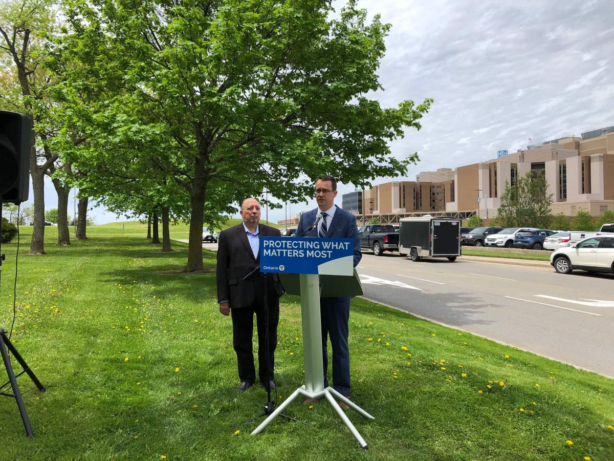 Sarnia Lambton MPP Bob Bailey, left, and Lambton-Kent-Middlesex MPP Monte McNaughton address reporters in London, Ont.