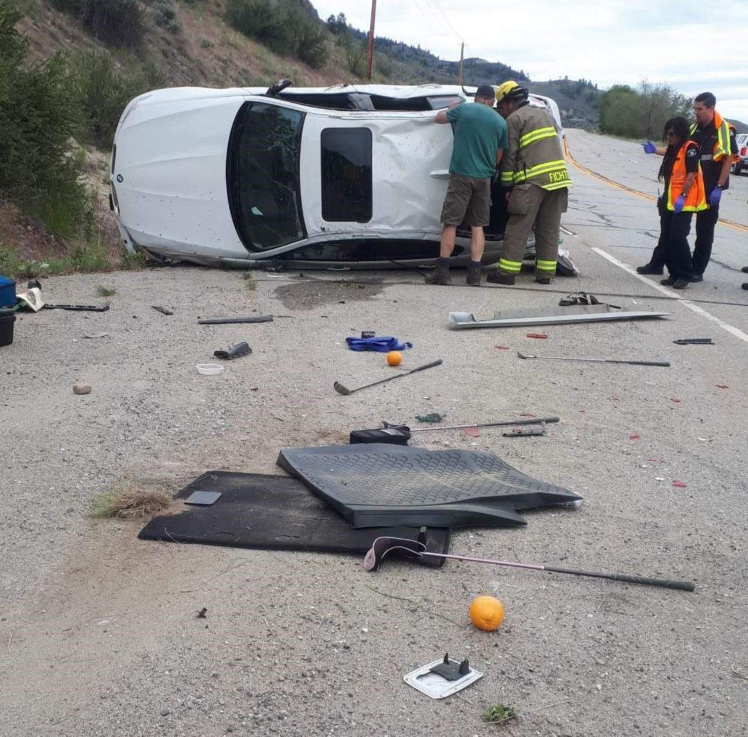 Emergency crews inspect the rollover prior to cutting open the roof. The accident happened just before 2 p.m. on Monday.