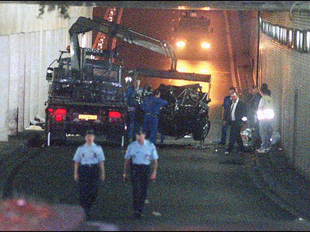 The wreckage of Princess Diana’s car is lifted on a truck in the Alma tunnel of Paris on August 31, 1997.