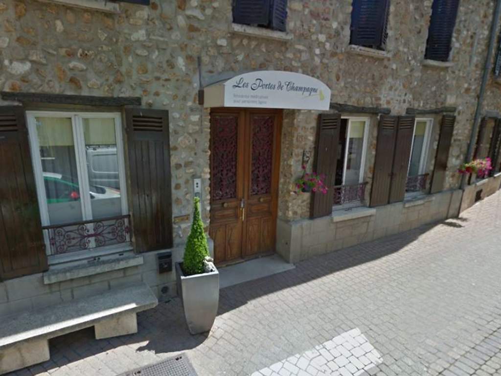 The front door of a retirement home in Chézy-sur-Marne, where a resident was allegedly killed by her neighbour.