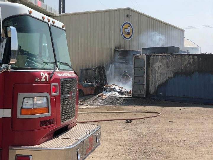 One person was treated at the scene of a shipping container fire in Saskatoon on May 30, 2019, for what officials believe to be minor burns.
