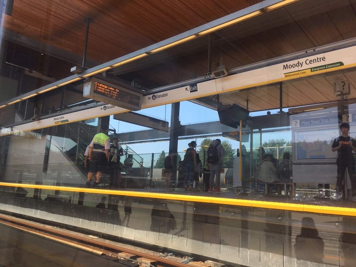 SkyTrain staff at Moody Station on Friday. 