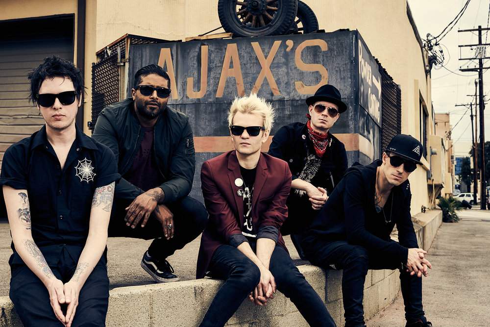 (L-R) Sum 41: Jason McCaslin, Dave Baksh, Deryck Whibley, Tom Thacker and Frank Zummo, in 2019.