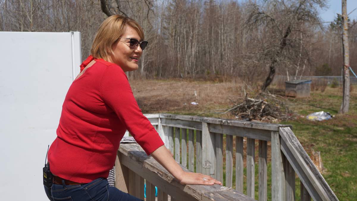 Vanessa Brooks looks over the Millbrook First Nation cemetery from her porch on May 6, 2019.