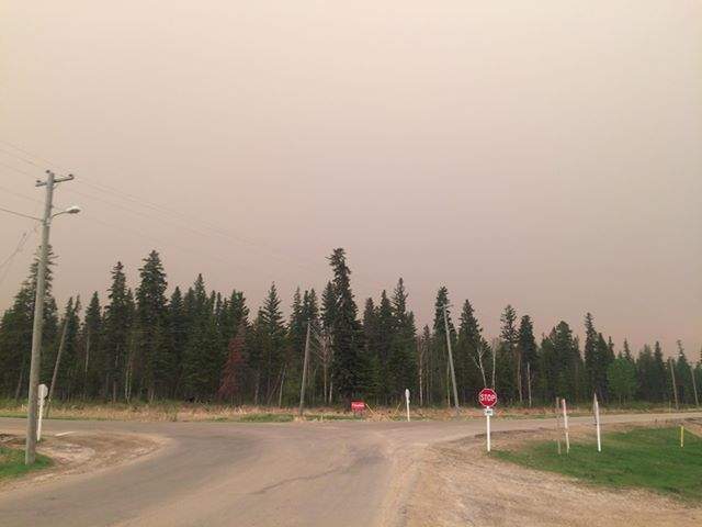A orange haze in the sky over Wabasca, Alta., on Sunday, May 26, 2019, which is south of the Trout Lake wildfire that began over the weekend. 
