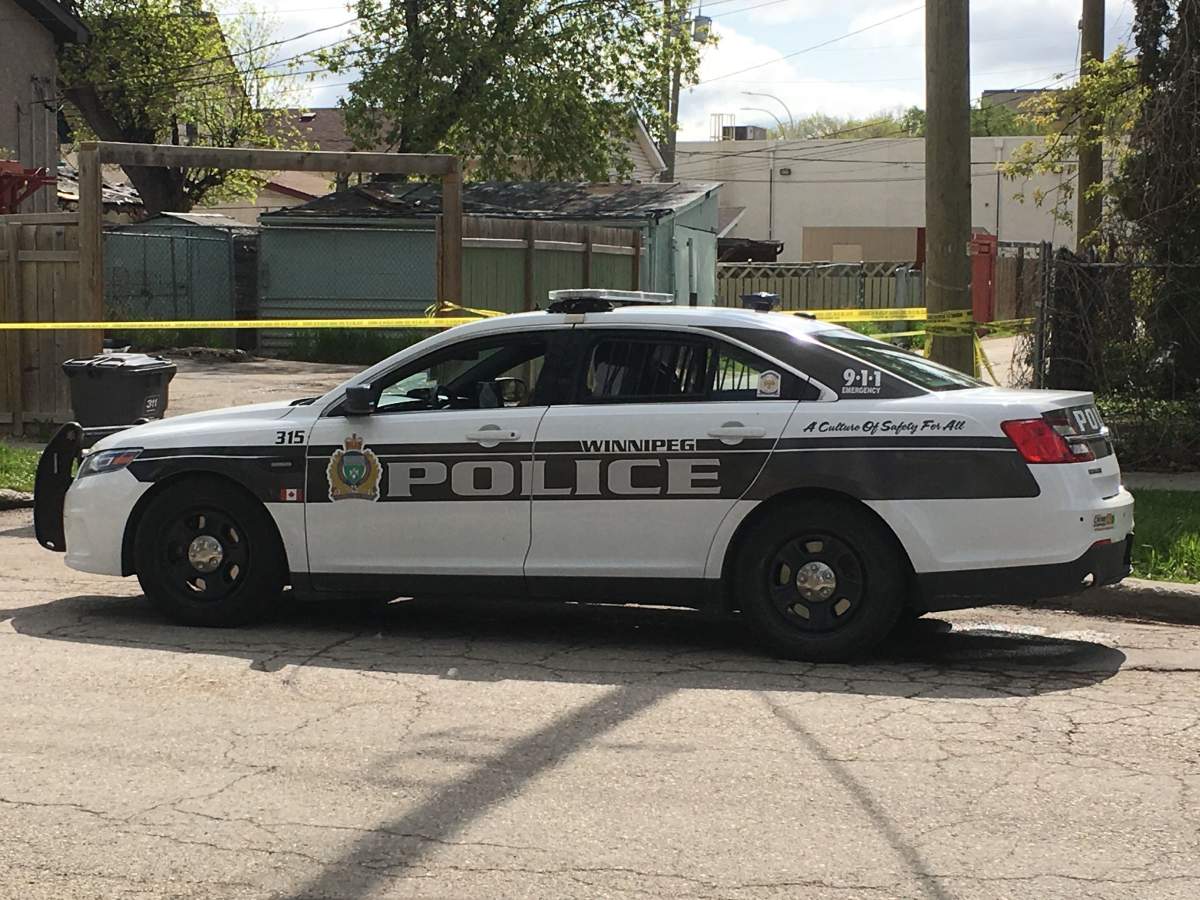 A police cruiser is seen near the area of Salter Street and Boyd Avenue Saturday afternoon.