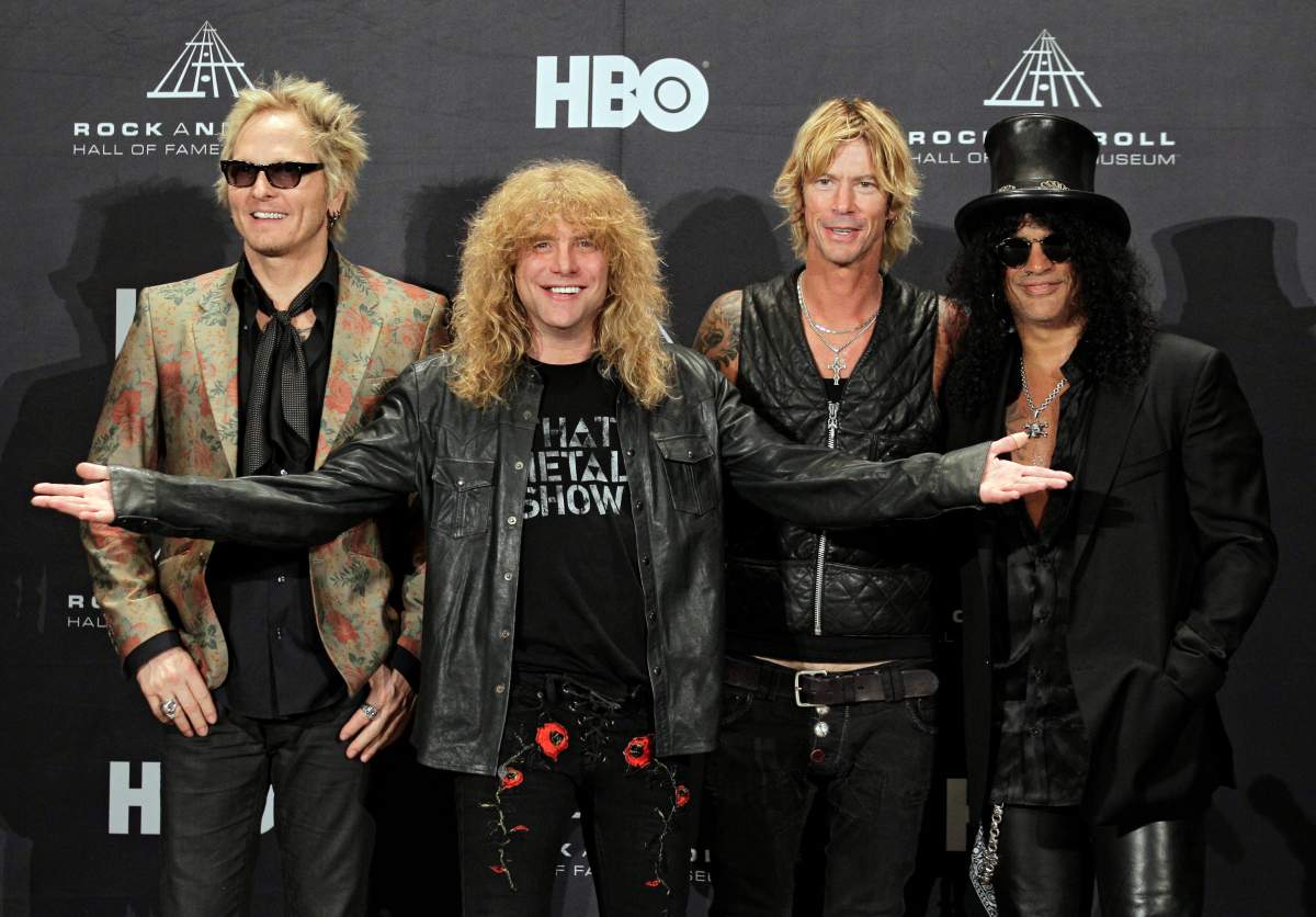 Guns N’ Roses, from left: Matt Sorum, Steven Adler, Duff McKagan and Slash appear in the press room after induction into the Rock and Roll Hall of Fame, on April 14, 2012, in Cleveland, Ohio.