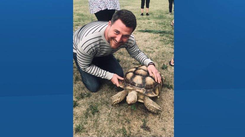 Oski Pasikoniwew Kamik junior high teacher, Daylan Troost, with the tortoise on June 19, 2019.