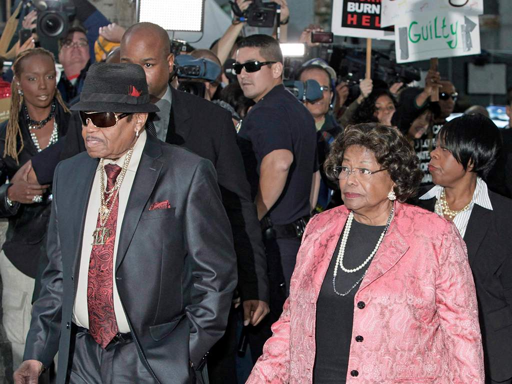 In this Nov. 7, 2011 file photo, Michael Jackson’s parents Joe and Katherine Jackson arrive at the Criminal Justice Center in downtown Los Angeles, Calif., after it was announced that jurors had reached a verdict in the involuntary manslaughter trial of Dr. Conrad Murray.
