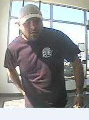 Police release photos of suspects in Burlington distraction theft - image